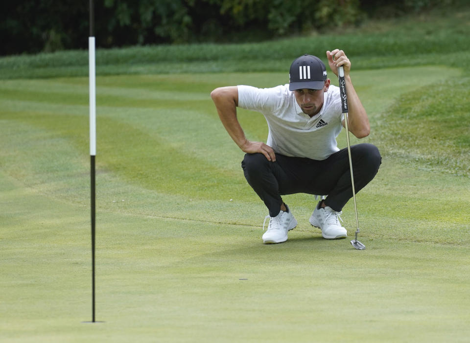 Joaquin Niemann lines up a putt on the 13th green during the final round of the LIV Golf Invitational-Boston tournament, Sunday, Sept. 4, 2022, in Bolton, Mass. (AP Photo/Mary Schwalm)