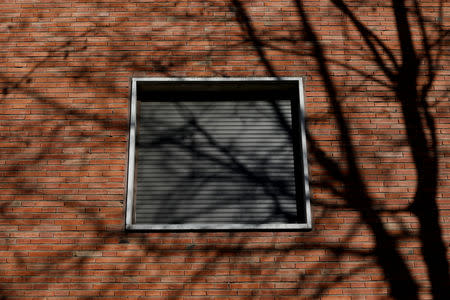 The window of one of the rooms of the Padre Trinitarios school where philosophy teacher Teresa Conde, 52, says she was raped by a priest 30 years her senior when she was 14, is seen in Salamanca, Spain, February 7, 2019. REUTERS/Susana Vera