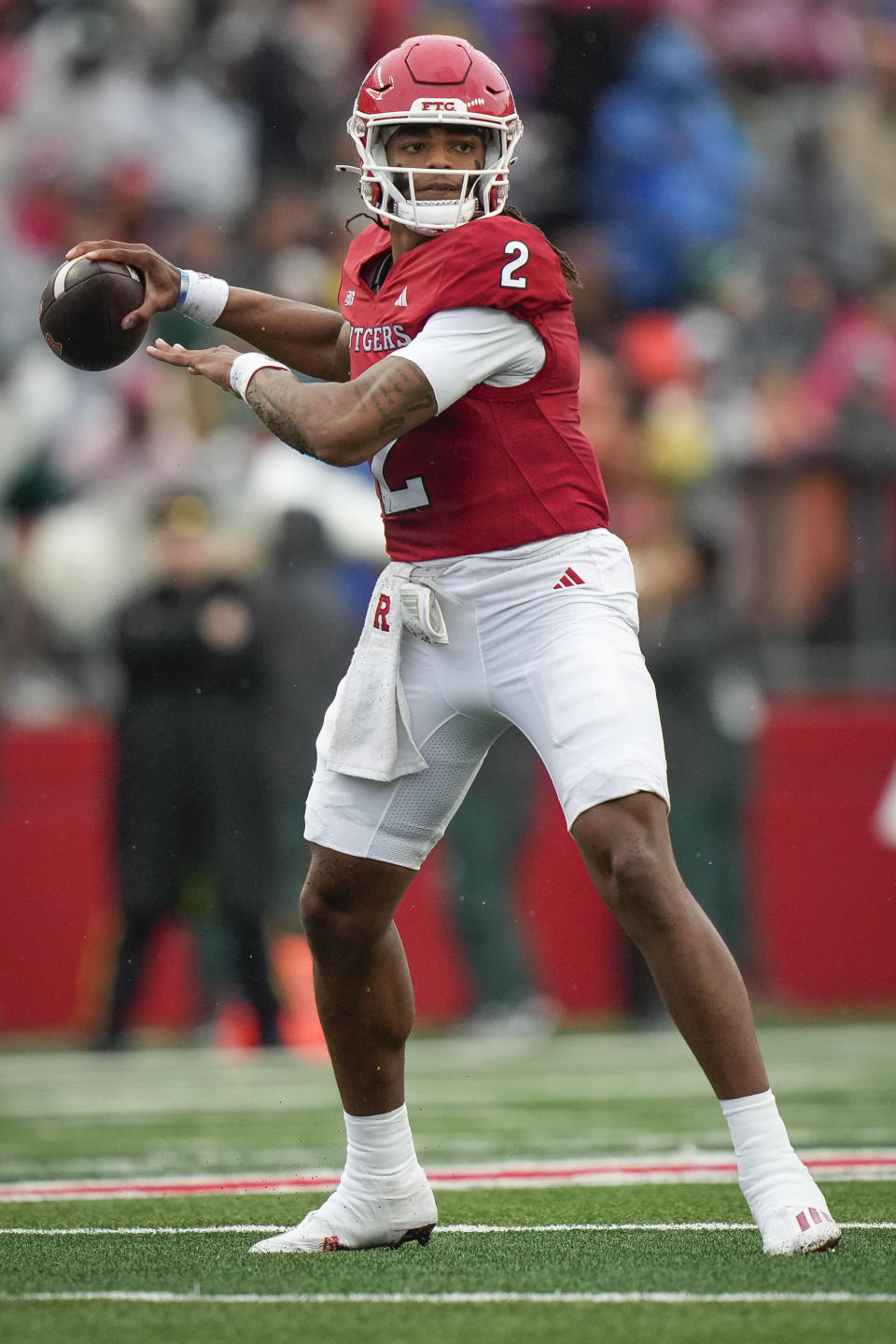 Rutgers quarterback Gavin Wimsatt (2) throws a pass during the first half of an NCAA college football game against Michigan State, Saturday, Oct. 14, 2023, in Piscataway, NJ. (AP Photo/Bryan Woolston)