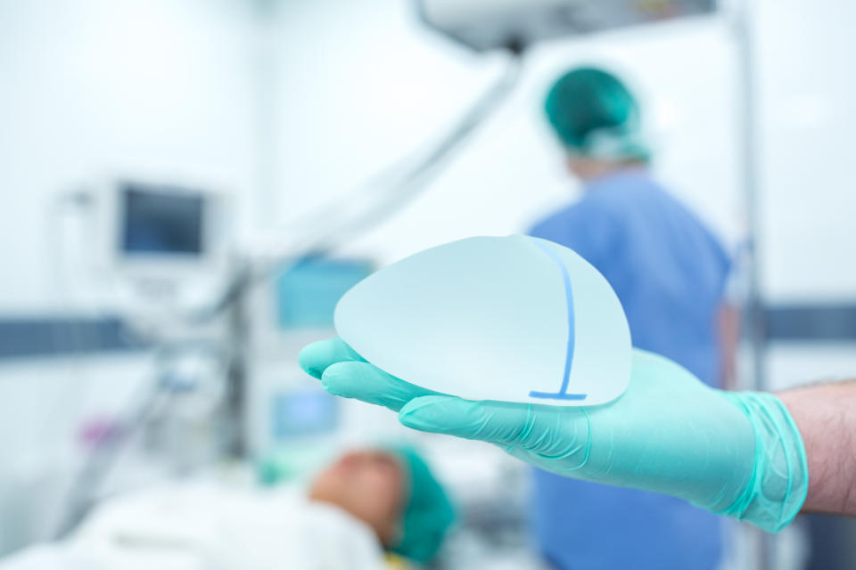 Women have said that having their breast implants removed improved their overall health. (Image via Getty Images)