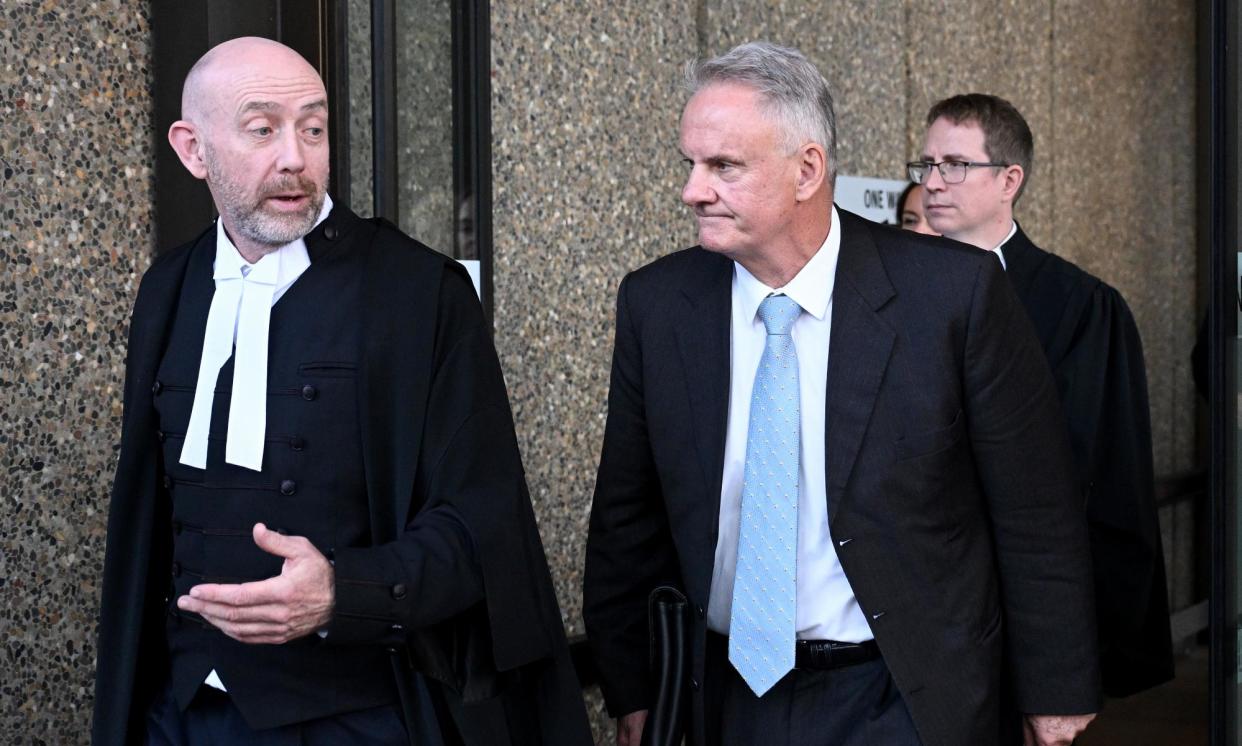 <span>Mark Latham (right) leaves the federal court in Sydney with barrister Kieran Smark SC after defamation proceedings brought by Independent NSW MP for Sydney Alex Greenwich.</span><span>Photograph: Dan Himbrechts/AAP</span>
