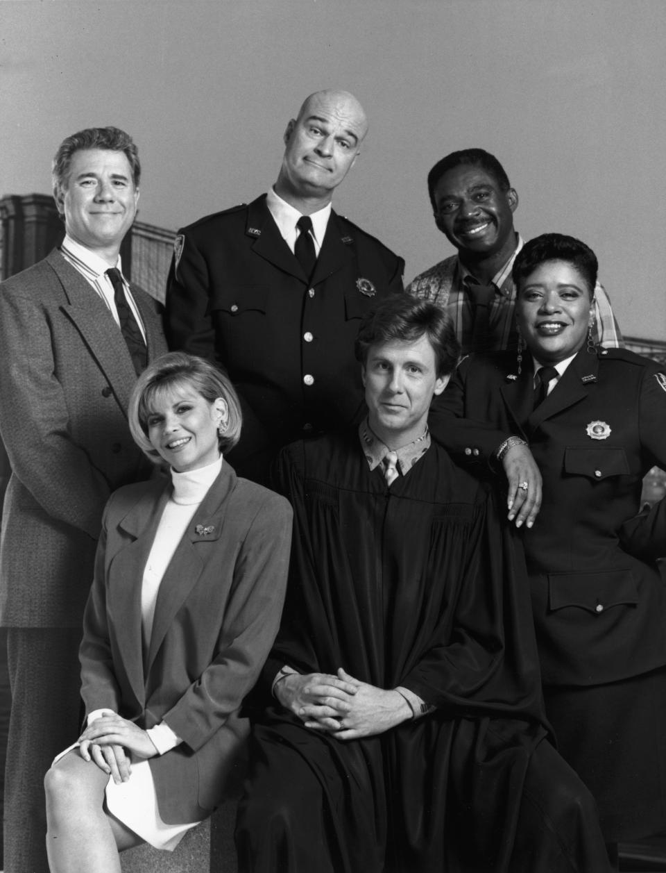 NBC's "Night Court" cast in the 1980s: (front row, from left): Markie Post, Harry Anderson, Marsha Warfield. At rear: John Larroquette, Richard Moll and Charles Robinson.
