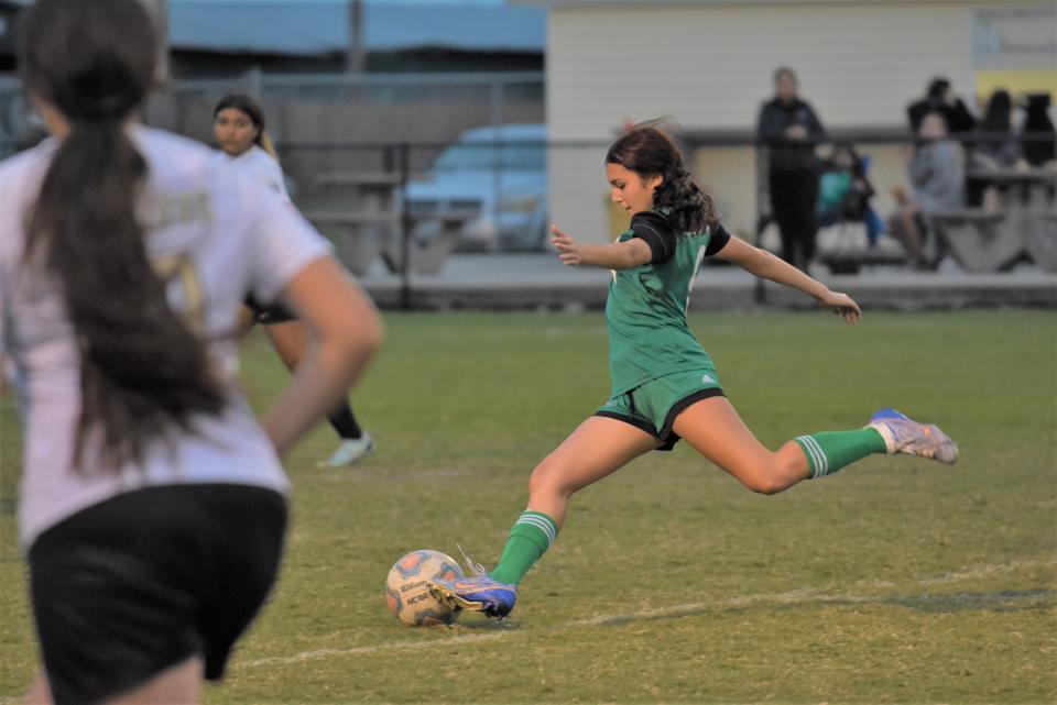 Glades Day's Amia Ocanas takes a shot on goal during a regular season game against Moore Haven on Dec. 21, 2023.