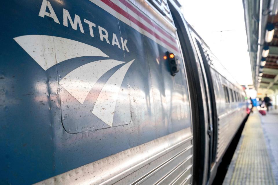 (FILES) In this file photo taken on April 22, 2022, the Amtrak logo is seen on a train at Union Station in Washington, DC. - Several cars of a long-distance train derailed on the afternoon of June 27, 2022, in the US state of Missouri, with early reports of injuries among the nearly 250 passengers, the rail company said. (Photo by Stefani Reynolds / AFP) (Photo by STEFANI REYNOLDS/AFP via Getty Images)