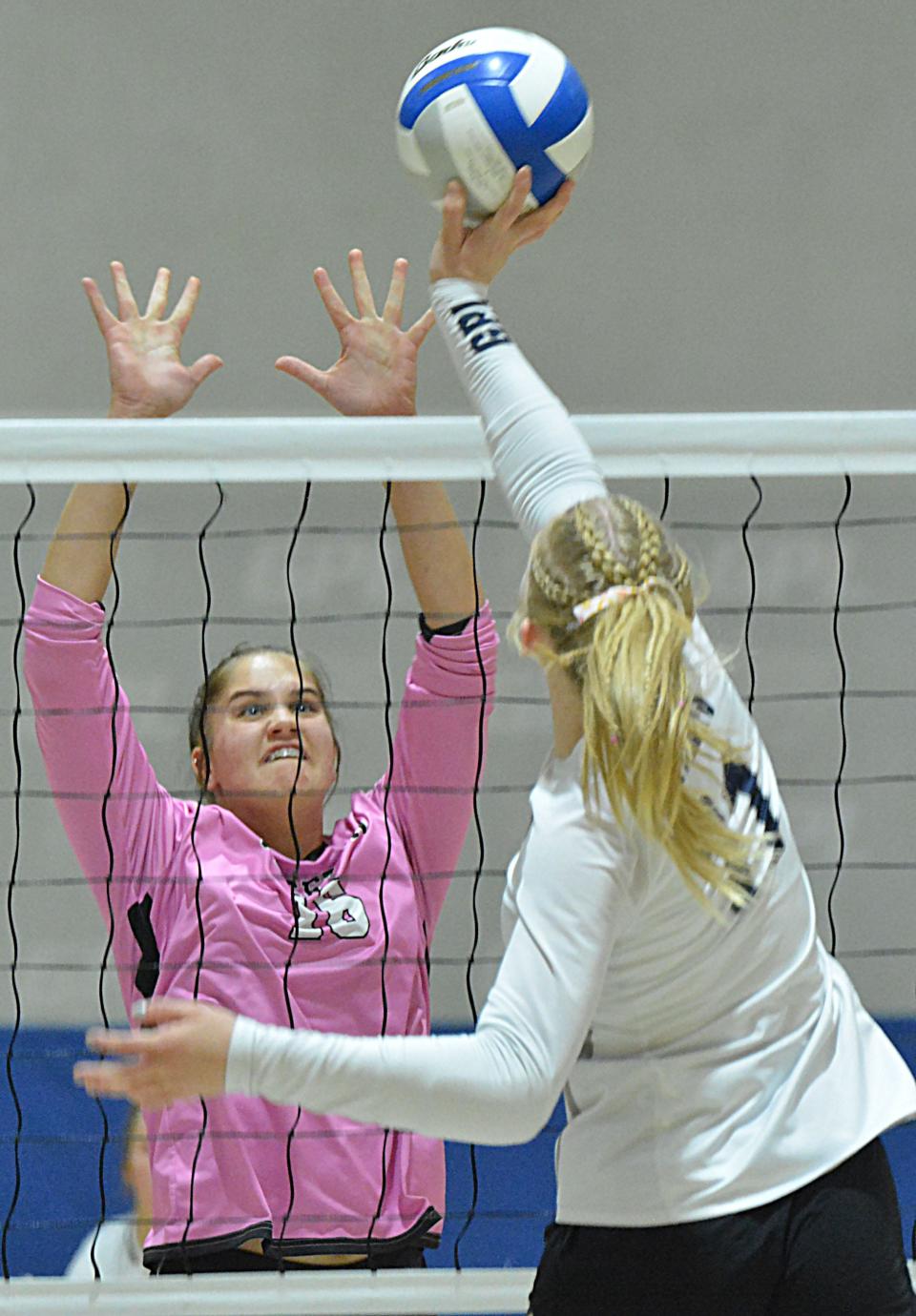 Sisseton's Krista Langager (16) goes up for the block against Great Plains Lutheran's Olivia Holmen during their high school volleyball match on Tuesday, Oct. 24, 2023 in Watertown.