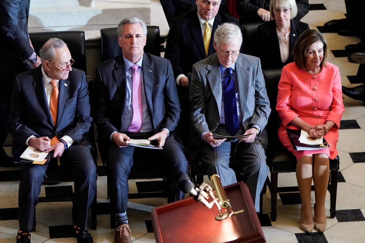 Senate Minority Leader Chuck Schumer (D-NY), House Minority Leader Kevin McCarthy (R-CA), Senate Majority Leader Mitch McConnell (R-KY) and U.S. House Speaker Nancy Pelosi (D-CA) sit together during a Congressional Gold Medal Award ceremony for Steve Gleason at the U.S. Capitol in Washington, U.S., January 15, 2020. REUTERS/Joshua Roberts