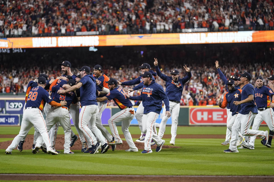 The Houston Astros celebrate their 4-1 World Series win against the Philadelphia Phillies in Game 6 on Saturday, Nov. 5, 2022, in Houston. (AP Photo/Tony Gutierrez)