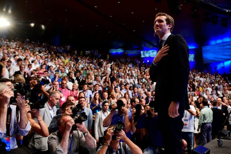 Casado acknowledges delegates after being chosen as the next leader of Spain's Popular Party (PP) at the end of a party meeting in Madrid on July 21, 2018