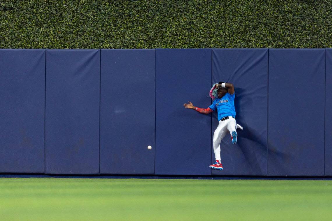 Miami Marlins center fielder Jazz Chisholm Jr. (2) fails to make a catch during the fifth inning of an MLB game against the Los Angeles Angels at LoanDepot Park in Miami, Florida, on Wednesday, April 2, 2024.
