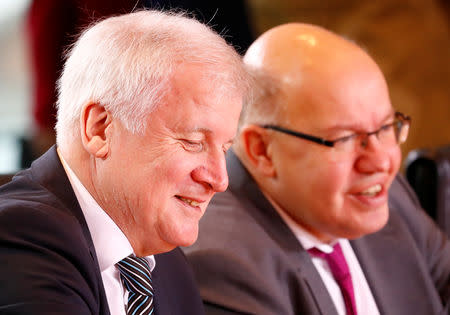 German Interior Minister Horst Seehofer and Economy Minister Peter Altmaier attend the weekly cabinet meeting in Berlin, Germany, December 19, 2018. REUTERS/Fabrizio Bensch