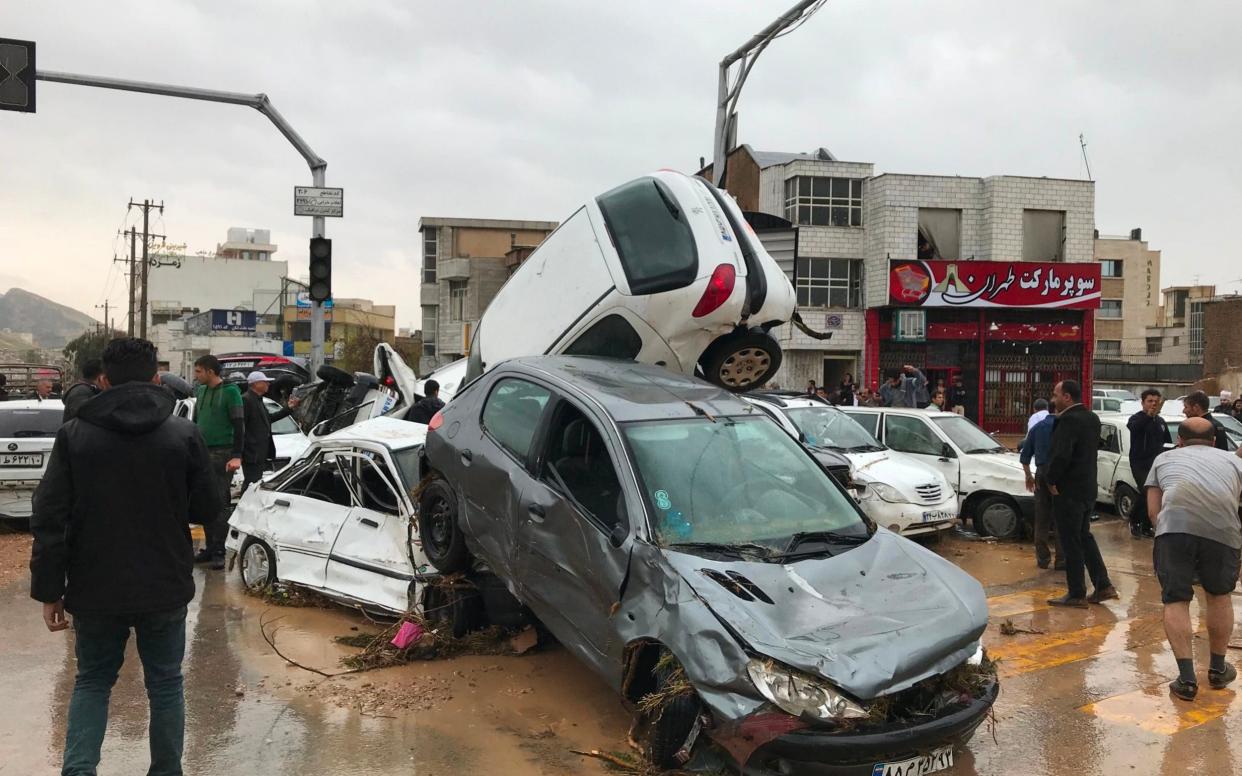 Cars were left pilling up in a street in the southern city of Shiraz - AFP