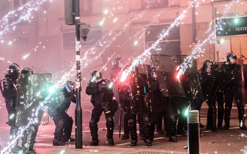 Police clash with protesters in Nantes on Tuesday night - AFP