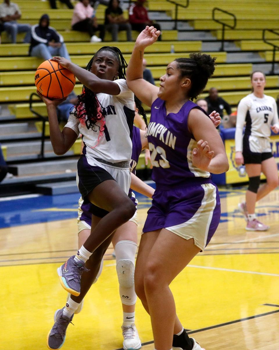 Calvary's Destini Gooddine attempts to go up for a basket against Lumpkin County's Kate Jackson during the 3A semifinals on Friday March 3, 2023 at Fort Valley State University.