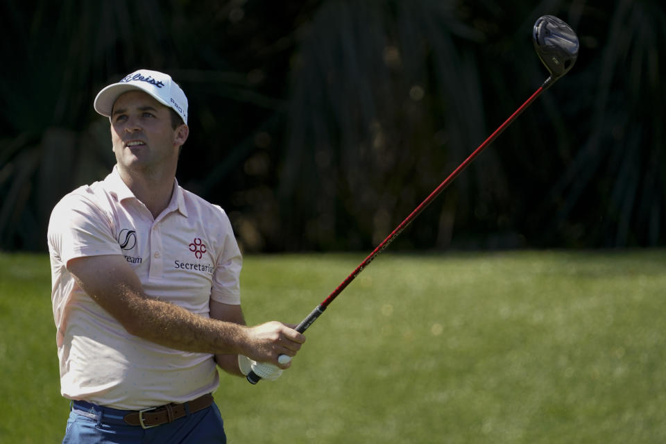 Denny McCarthy watches his tee shot on the seventh hole during the second round of the The Players Championship golf tournament Friday, March 12, 2021, in Ponte Vedra Beach, Fla. (AP Photo/John Raoux)