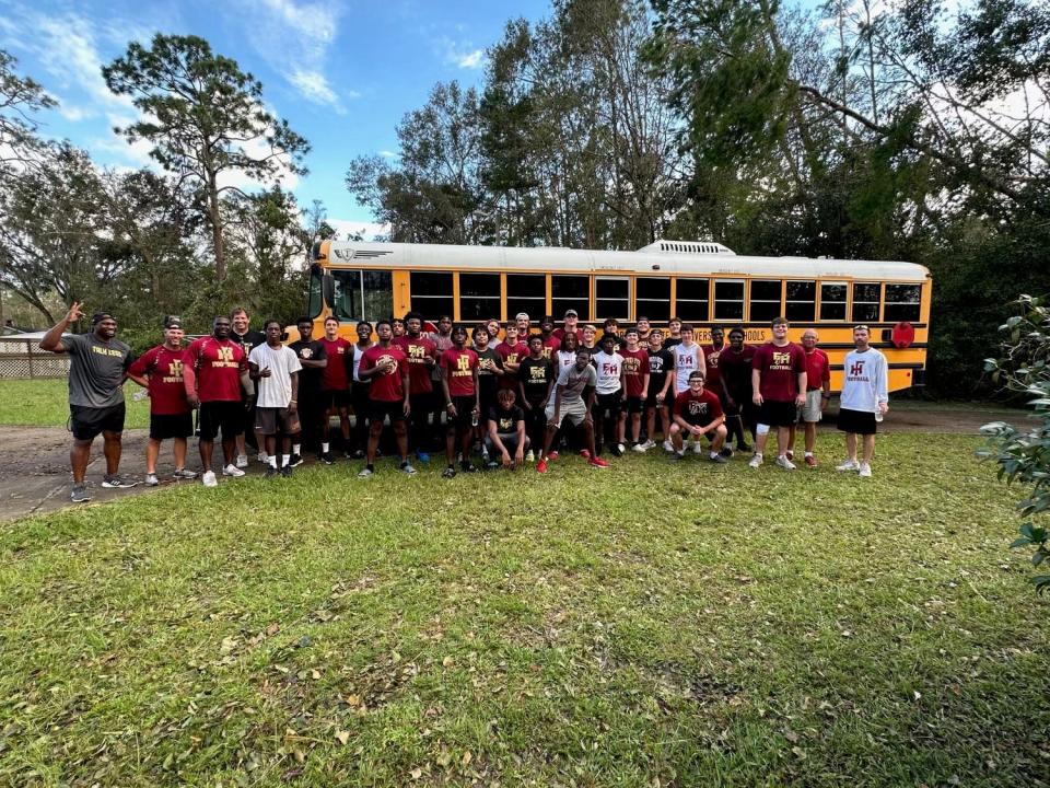 The Florida High football team traveled to Perry Thursday following its practice to help residents pick up debris after Hurricane Idalia.