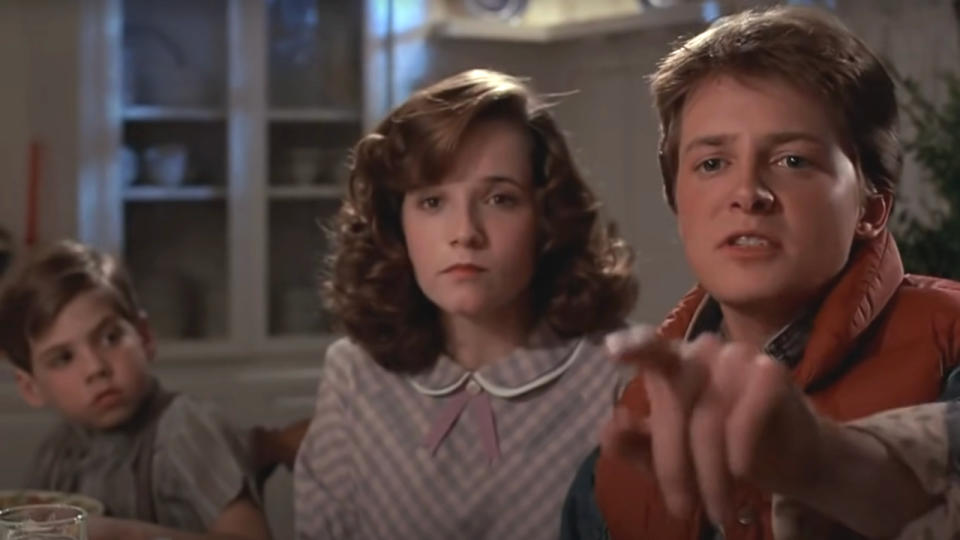 Michael J Fox points out a rerun to Lea Thompson in Back To The Future.