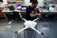 Don't stand so close: Singapore trials automated drones to check