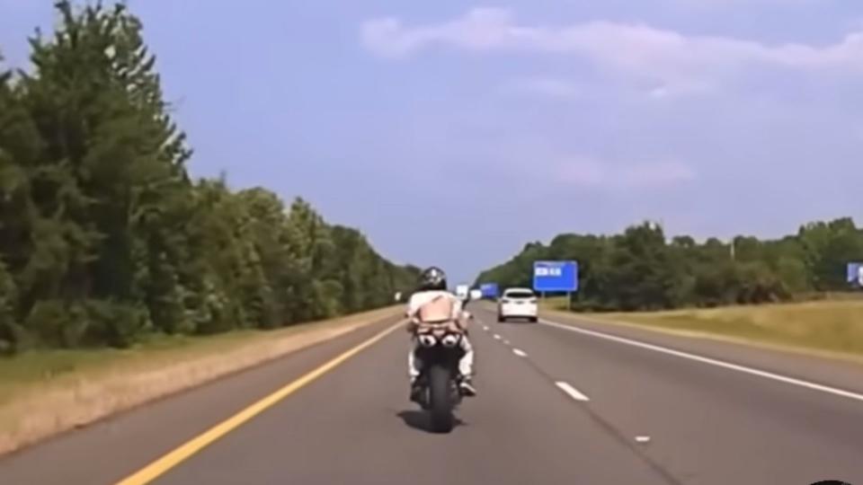 Fleeing Motorcyclist Rear Ends Car At 135 MPH