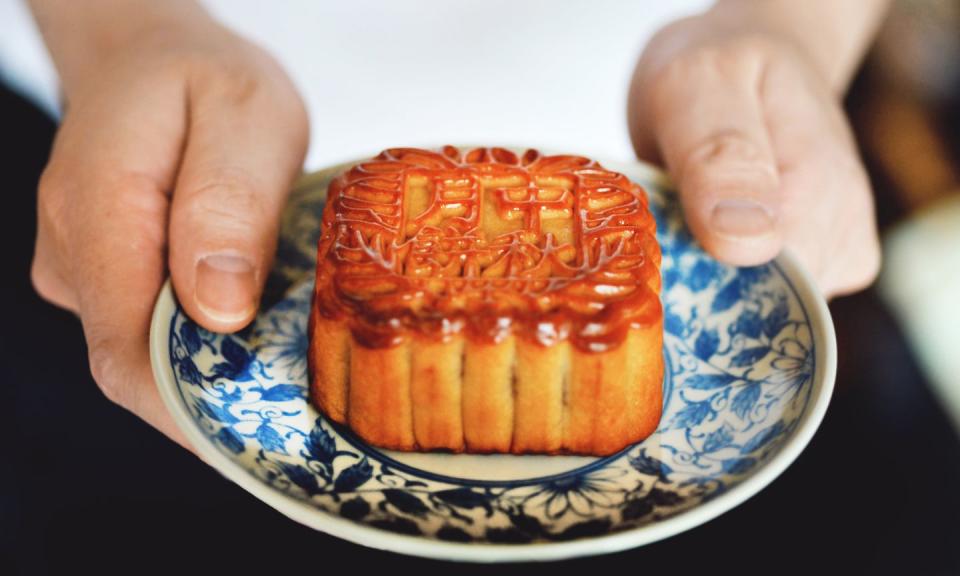 a mooncake is a chinese bakery product traditionally eaten during the mid autumn festival the festival is for lunar worship and moon watching, when mooncakes are regarded as an indispensable delicacy mooncakes are offered between friends or on family gatherings while celebrating the festival the mid autumn festival is one of the four most important chinese festivals