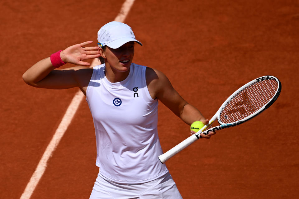 PARIS, FRANCE - JUNE 07: Iga Swiatek of Poland celebrates winning match point against Coco Gauff of United States during the Women's Singles Quarter Final match on Day Eleven of the 2023 French Open at Roland Garros on June 07, 2023 in Paris, France. (Photo by Clive Mason/Getty Images)