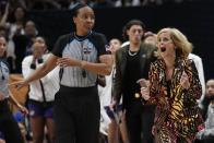 LSU head coach Kim Mulkey reacts during the first half of the NCAA Women's Final Four championship basketball game against Iowa Sunday, April 2, 2023, in Dallas. (AP Photo/Tony Gutierrez)