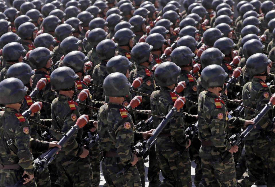 North Korean soldiers march during a parade for the 70th anniversary of North Korea's founding day in Pyongyang, North Korea, Sunday, Sept. 9, 2018. North Korea staged a major military parade, huge rallies and will revive its iconic mass games on Sunday to mark its 70th anniversary as a nation. (AP Photo/Kin Cheung)