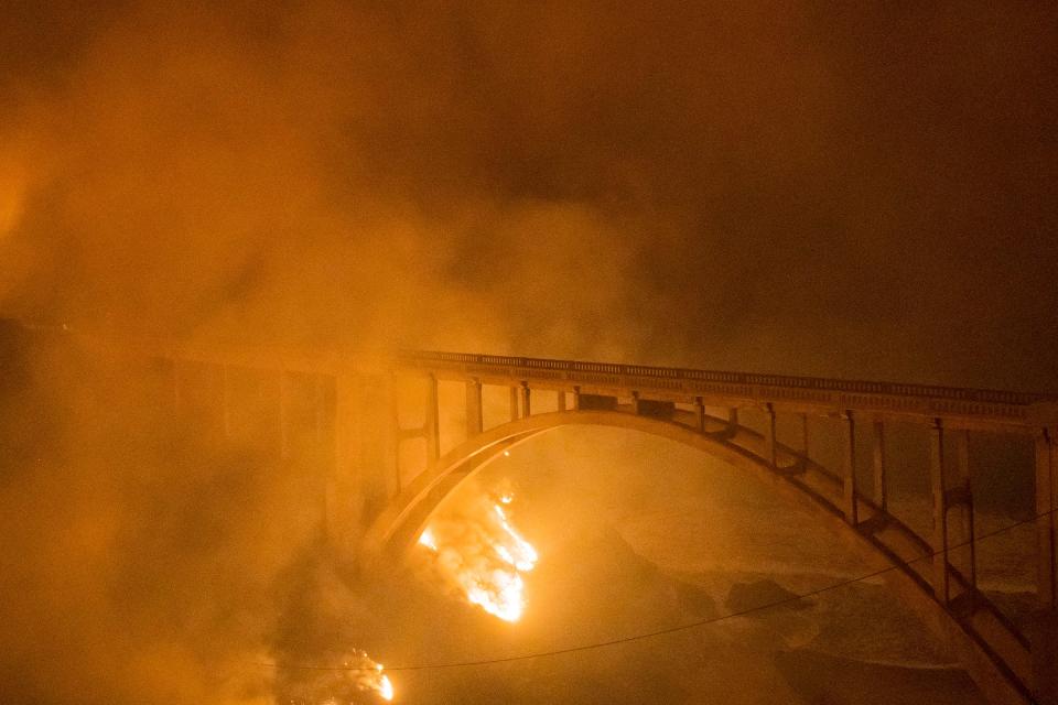 The wildfire started in the Palo Colorado canyon in California late Friday before wind gusts of up to 50 mph pushed it toward the coast. The blaze has burned through 1,050 acres.