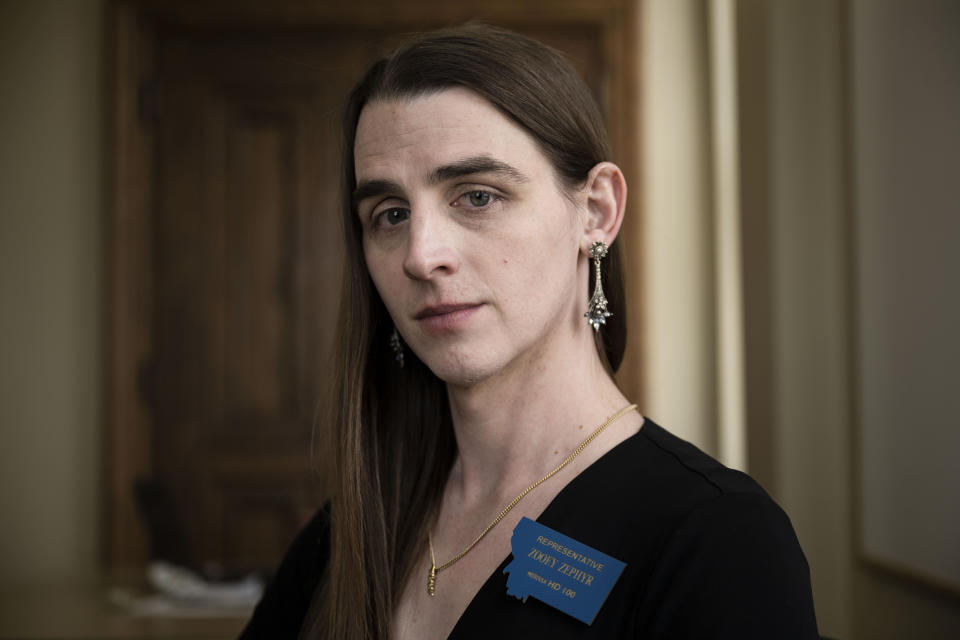 FILE - Rep. Zooey Zephyr poses for a photo at the Montana State Capitol in Helena, Mont., on April 26, 2023. The banishment of transgender lawmaker Zephyr from Montana's House floor has showcased the rising power of hardline conservatives who are leveraging divisive social issues to gain political influence. (AP Photo/Tommy Martino, File)