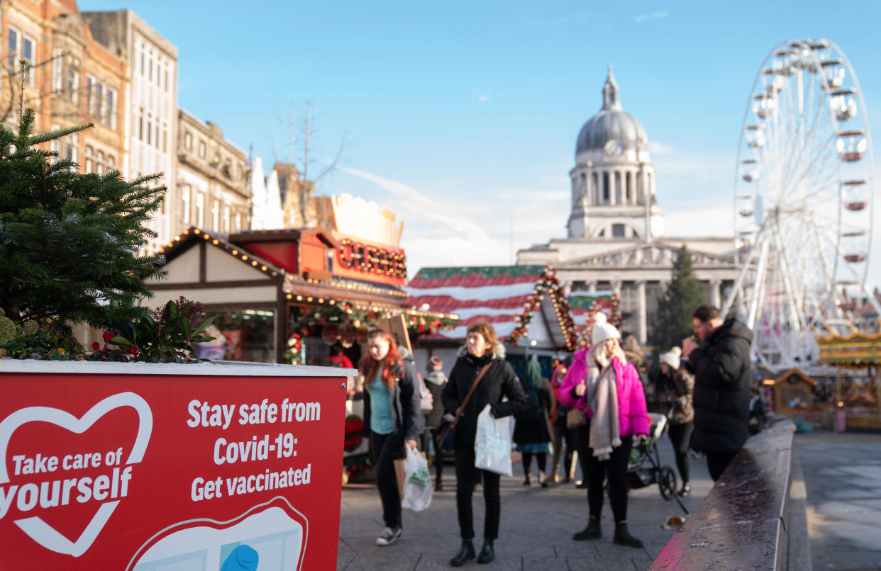 Coronavirus guidance on signs in Nottingham, the city where one of the two cases of the Omicron variant of Covid-19 were identified last week. (Photo by Joe Giddens/PA Images via Getty Images)