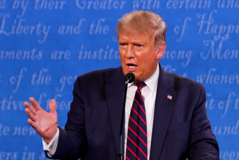 U.S. President Donald Trump and Democratic presidential nominee Joe Biden participate in their first 2020 presidential campaign debate in Cleveland