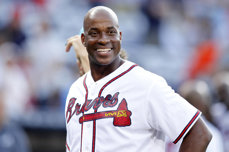 FILE - Former Atlanta Braves first baseman Fred McGriff smiles on the field before a baseball game against the Miami Marlins, Friday, Aug. 7, 2015, in Atlanta. Barry Bonds, Roger Clemens and Curt Schilling were passed over by a Baseball Hall of Fame committee that elected former big league slugger Fred McGriff to Cooperstown on Sunday, Dec. 4, 2022. (AP Photo/Brett Davis, File)