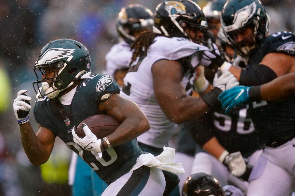 Philadelphia Eagles' Miles Sanders runs with the ball during the second half of an NFL football game against the Jacksonville Jaguars on Sunday, Oct. 2, 2022, in Philadelphia.