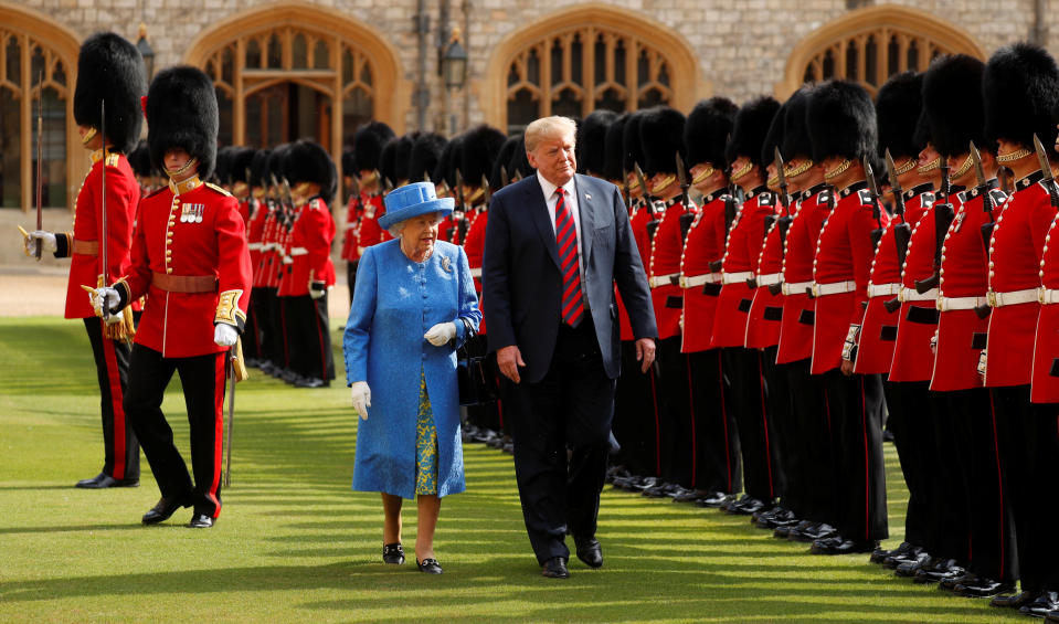 <p>U.S. President Donald Trump and Britain’s Queen Elizabeth inspect the Coldstream Guards during a visit to Windsor Castle in Windsor, Britain, July 13, 2018. REUTERS/Kevin Lamarque </p>