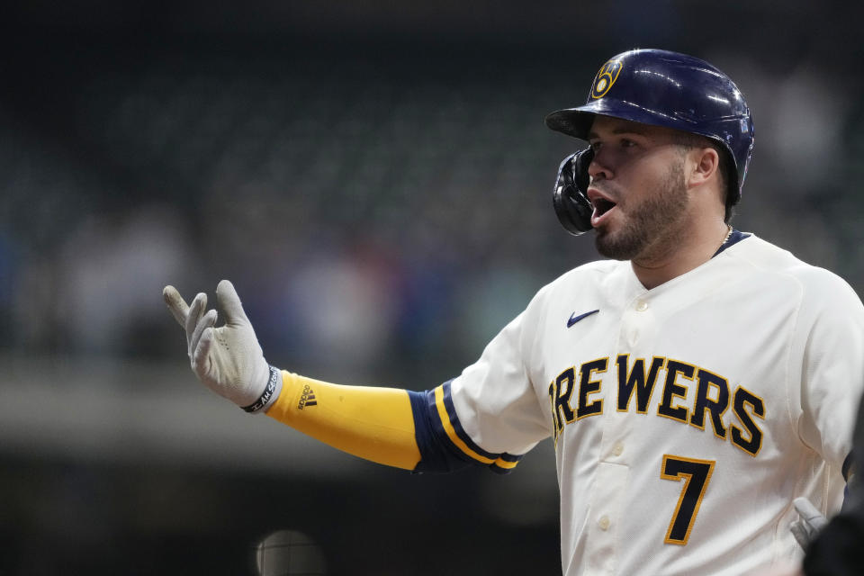 MILWAUKEE, WISCONSIN - AUGUST 16: Victor Caratini #7 of the Milwaukee Brewers celebrates after hitting a walk-off two RBI single against the Los Angeles Dodgers in the 11th inning at American Family Field on August 16, 2022 in Milwaukee, Wisconsin. The Brewers defeated the Dodgers 5-4. (Photo by Patrick McDermott/Getty Images)