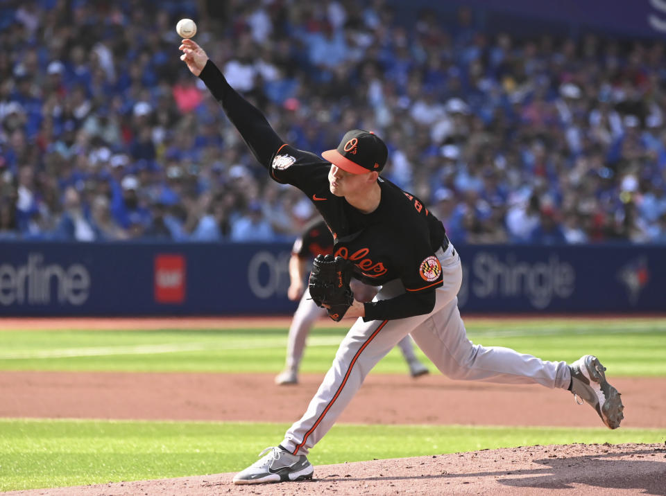 Baltimore Orioles starting pitcher Kyle Bradish throws to a Toronto Blue Jays batter in first-inning baseball game action in Toronto, Saturday, Sept. 17, 2022. (Jon Blacker/The Canadian Press via AP)