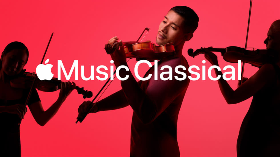  Violinists perform against red backdrop and white Apple Music Classical logo 