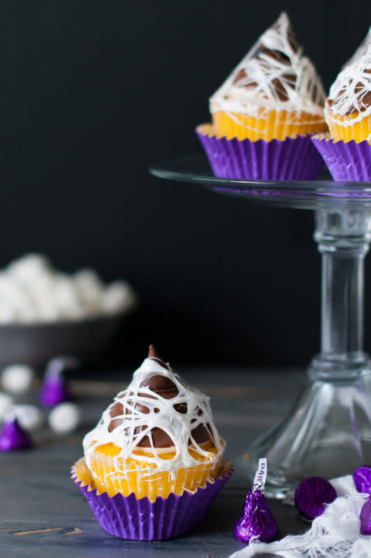 <p>Handmade Charlotte</p><p>If you’re constantly looking for ways to expand your creepy baking skills, head over to <a href="https://www.handmadecharlotte.com/spooky-marshmallow-web-cupcake-topper/" rel="nofollow noopener" target="_blank" data-ylk="slk:Handmade Charlotte;elm:context_link;itc:0;sec:content-canvas" class="link ">Handmade Charlotte</a> to see how you can put a hair-crawling twist on your basic vanilla cupcakes!</p>