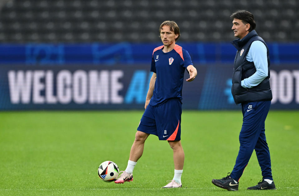 BERLIN, GERMANY - JUNE 14: Luka Modric of Croatia talks with Zlatko Dalic, Manager of Croatia during a training session ahead of their UEFA EURO 2024 match against Spain at Olympiastadion on June 14, 2024 in Berlin, Germany. (Photo by Dan Mullan/Getty Images)