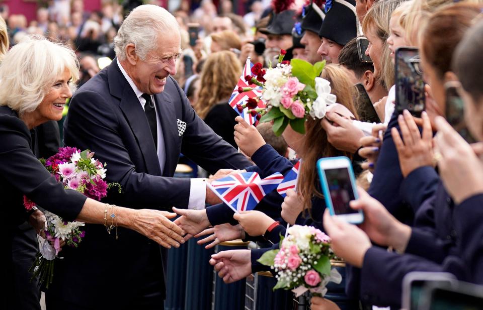 Britain's King Charles III and Britain's Camilla, Queen Consort greet wellwishers