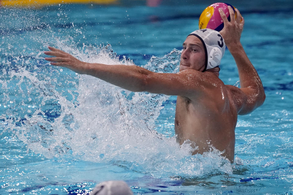 United States' Marko Vavic (3) shoots against Italy during a preliminary round men's water polo match at the 2020 Summer Olympics, Thursday, July 29, 2021, in Tokyo, Japan. (AP Photo/Mark Humphrey)