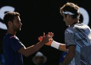 Tennis - Australian Open - Melbourne Park, Melbourne, Australia - 18/1/17 Switzerland's Roger Federer shakes hands after winning his Men's singles second round match against Noah Rubin of the U.S. .REUTERS/Edgar Su