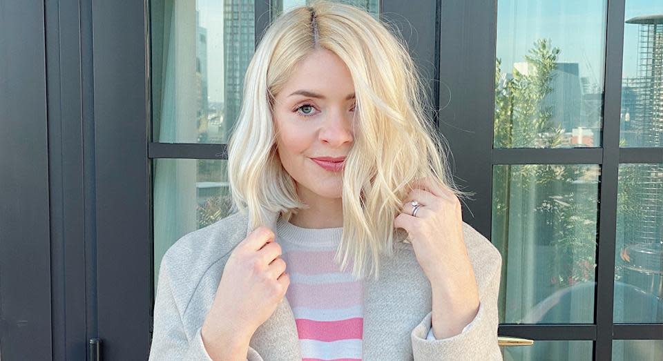 Holly Willoughby brightens up our day with a colourful rainbow jumper. (Marks and Spencer)
