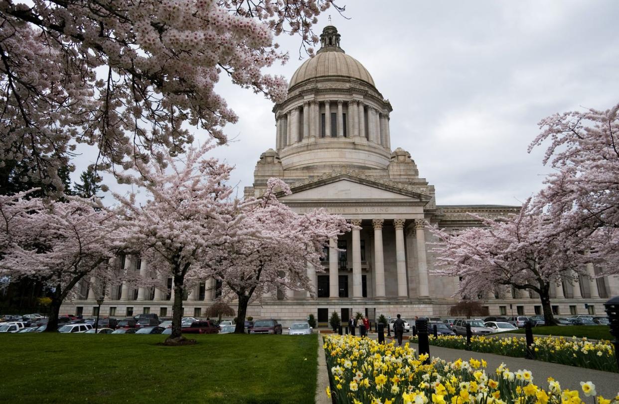 <span class="caption">Washington state cut both merit raises and instituted furloughs as it faced a projected $8.8 billion budget deficit because of the coronavirus.</span> <span class="attribution"><a class="link " href="https://www.gettyimages.com/detail/news-photo/washington-state-olympia-state-capitol-building-with-spring-news-photo/452908636?adppopup=true" rel="nofollow noopener" target="_blank" data-ylk="slk:Wolfgang Kaehler/LightRocket via Getty Images;elm:context_link;itc:0;sec:content-canvas">Wolfgang Kaehler/LightRocket via Getty Images</a></span>