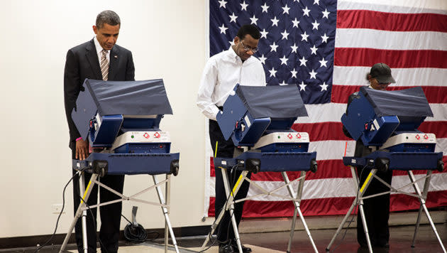 President Barack Obama casts an early ballot in the 2012 election. (White House File Photo)