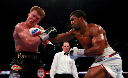 Boxing - Anthony Joshua v Alexander Povetkin - WBA Super, IBF, WBO & IBO World Heavyweight Titles - Wembley Stadium, London, Britain - September 22, 2018 Anthony Joshua in action against Alexander Povetkin Action Images via Reuters/Andrew Couldridge