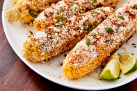 <p>Elote is an unbelievably popular <em>antojito</em> (little craving) that you can find sold on the street in Mexico. It's often served on a stick, though you could skip the skewer and make it the same way you'd <a href="https://www.delish.com/cooking/a22487458/corn-on-the-cob/" rel="nofollow noopener" target="_blank" data-ylk="slk:boil;elm:context_link;itc:0;sec:content-canvas" class="link ">boil</a> or <a href="https://www.delish.com/cooking/recipe-ideas/a27528956/oven-baked-corn-on-a-cob/" rel="nofollow noopener" target="_blank" data-ylk="slk:oven bake;elm:context_link;itc:0;sec:content-canvas" class="link ">oven bake</a> regular corn on the cob.</p><p>Get the <strong><a href="https://www.delish.com/cooking/recipe-ideas/recipes/a47269/mexican-street-corn-elote-recipe/" rel="nofollow noopener" target="_blank" data-ylk="slk:Elote: Mexican Street Corn recipe;elm:context_link;itc:0;sec:content-canvas" class="link ">Elote: Mexican Street Corn recipe</a></strong>.</p>