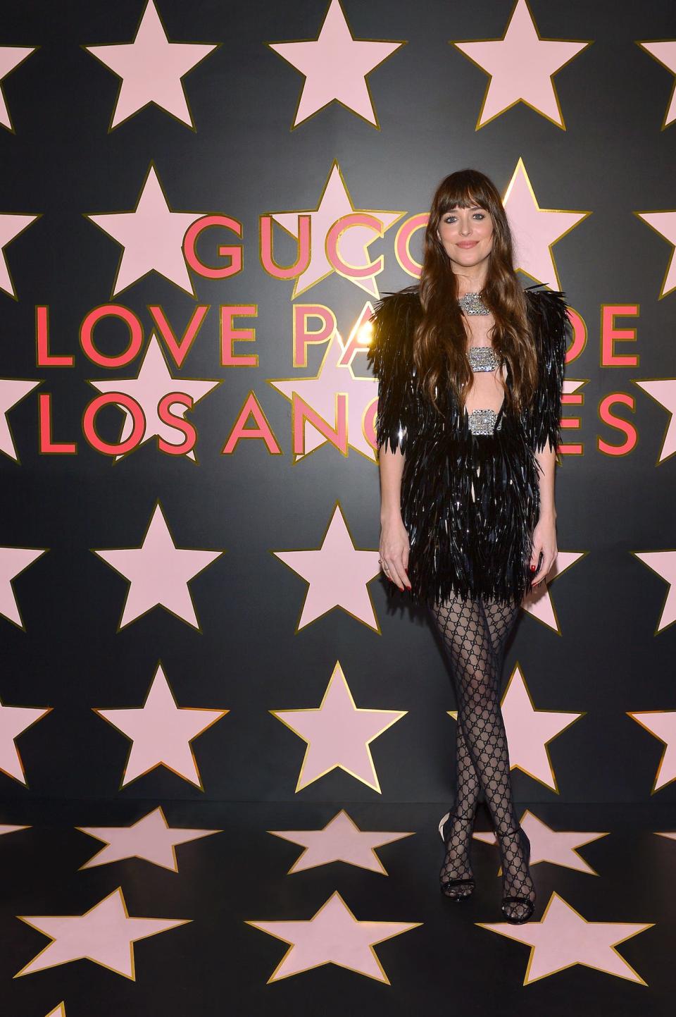 Dakota Johnson at Gucci's Love Parade fashion show on November 2, 2021.