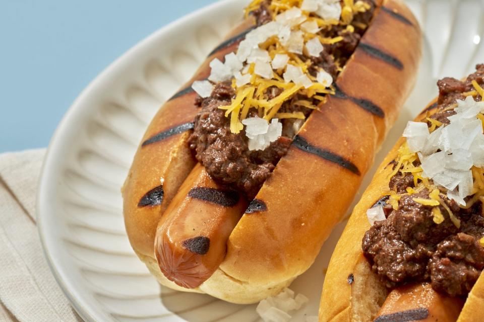 <p>We have to be honest, these meatless chili dogs might be better than the <a href="https://www.delish.com/cooking/recipe-ideas/a27921971/hot-dog-chili-recipe/" rel="nofollow noopener" target="_blank" data-ylk="slk:meat-full version;elm:context_link;itc:0;sec:content-canvas" class="link ">meat-full version</a>. Sure it's hard to replicate the snap of a true hot dog with <a href="https://www.delish.com/cooking/recipe-ideas/g39431167/plant-based-recipes/" rel="nofollow noopener" target="_blank" data-ylk="slk:plant-based;elm:context_link;itc:0;sec:content-canvas" class="link ">plant-based</a> ingredients, but this complex chili is truly world-changing. You're going to want to put it on <em>way</em> more than just veggie dogs. We see <a href="https://www.delish.com/cooking/recipe-ideas/recipes/a49097/chili-mac-cheese-recipe/" rel="nofollow noopener" target="_blank" data-ylk="slk:chili mac;elm:context_link;itc:0;sec:content-canvas" class="link ">chili mac</a>, <a href="https://www.delish.com/cooking/recipe-ideas/recipes/a46964/tamale-pie/" rel="nofollow noopener" target="_blank" data-ylk="slk:tamale pie;elm:context_link;itc:0;sec:content-canvas" class="link ">tamale pie</a>, and plenty of chili fries in your future.</p><p>Get the <strong><a href="https://www.delish.com/cooking/recipe-ideas/a36790969/vegan-chili-dogs-recipes/" rel="nofollow noopener" target="_blank" data-ylk="slk:Vegan Chili Dog recipe;elm:context_link;itc:0;sec:content-canvas" class="link ">Vegan Chili Dog recipe</a></strong>.</p>