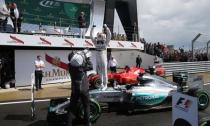 Formula One - F1 - British Grand Prix 2015 - Silverstone, England - 5/7/15 Mercedes' Lewis Hamilton celebrates his win Reuters / Paul Childs