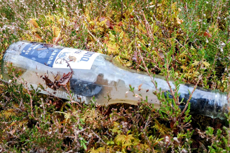 The bottle had been tossed onto the ground by louts